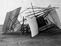 A photograph showing the aeroplane Manurewa with the wings broken off and the entire structure collapsed