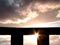 Heng silhouetted against dusk sky
