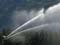 Moving spray irrigator