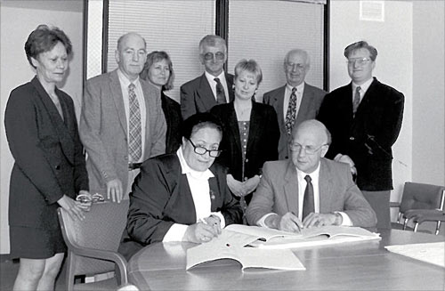 Signing a contract with the Justice Department