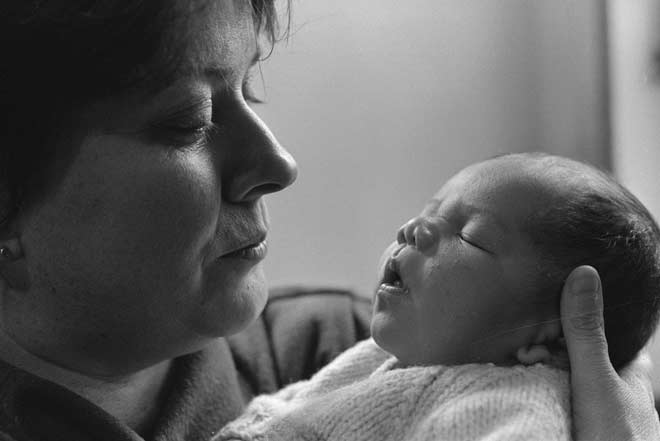 Midwife and baby, 1990