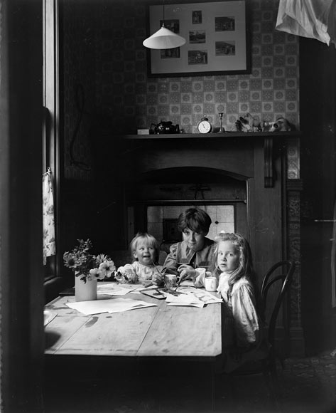 Minding siblings, around 1900