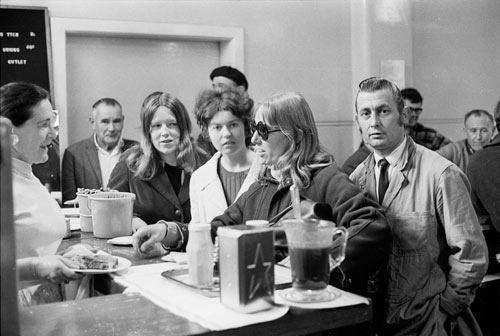 Women being served in a men-only bar
