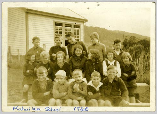 School kids group photo in front of classroom