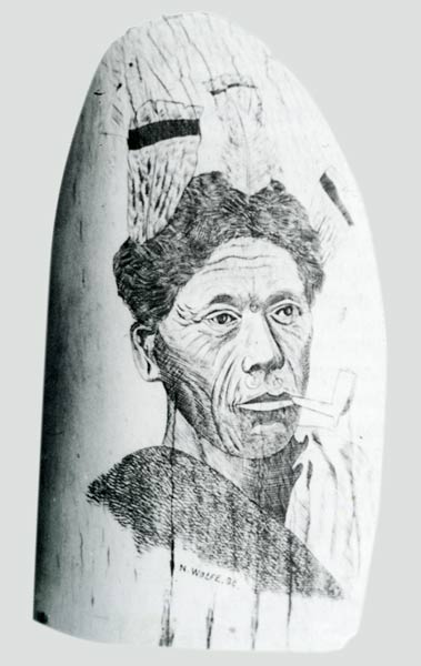 Carved whale's tooth