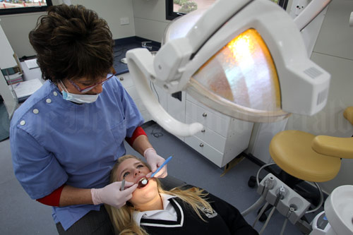 Dental therapist at work