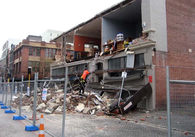 Collapsed brick walls in Worcester Street