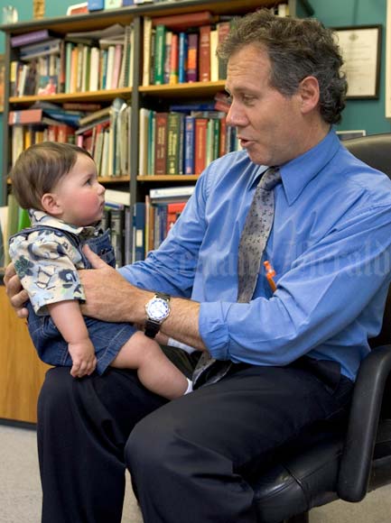 General practitioner with baby