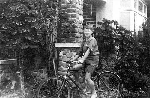 Young Alan on a bicycle