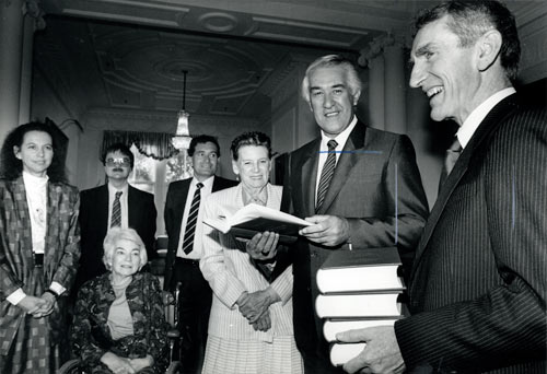 Governor-General Sir Paul Reeves with a new report on social policy.