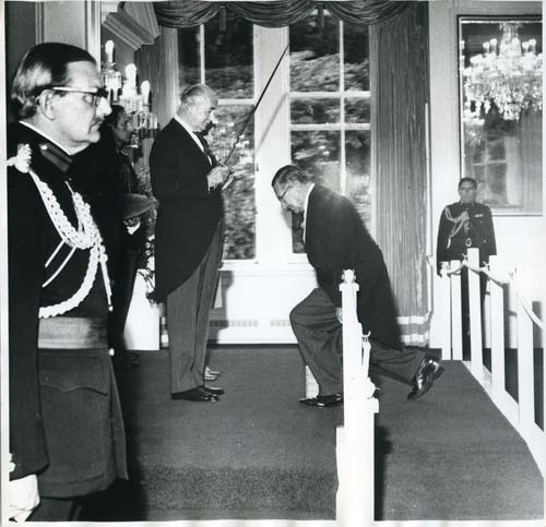 Sir Arthur Porritt knighting Philip Proctor