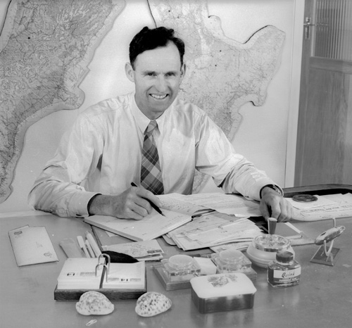 Piet van Asch at his desk