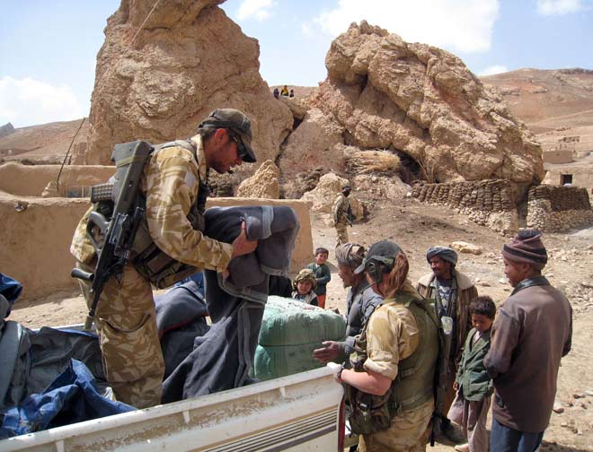 New Zealand soldiers in Afghanistan: distributing blankets