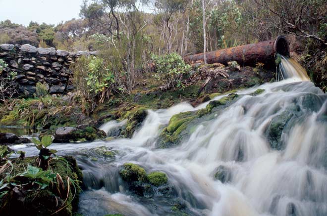 Tin mining: dam and pipe