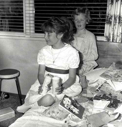 Unwrapping presents, 1960s