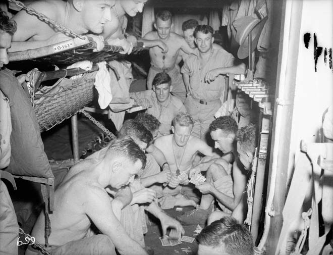 Playing cards on a troopship, 1943