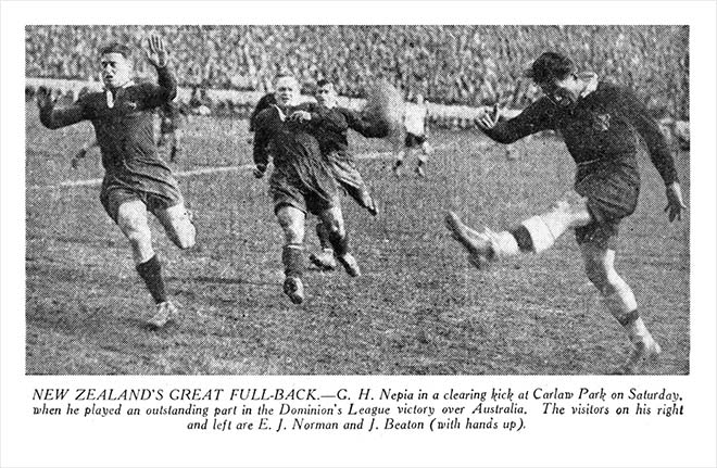 Rugby and rugby-league great George Nēpia, fullback, clears the ball in his only test match for the Kiwis league team