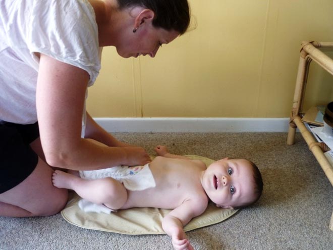 Changing a nappy, 2013