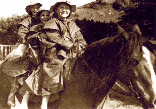 Three kids on a horse