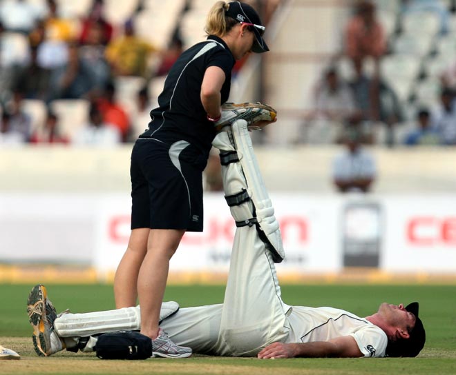Physio on the cricket field
