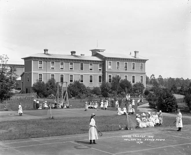 Girls playing tennis, 1889