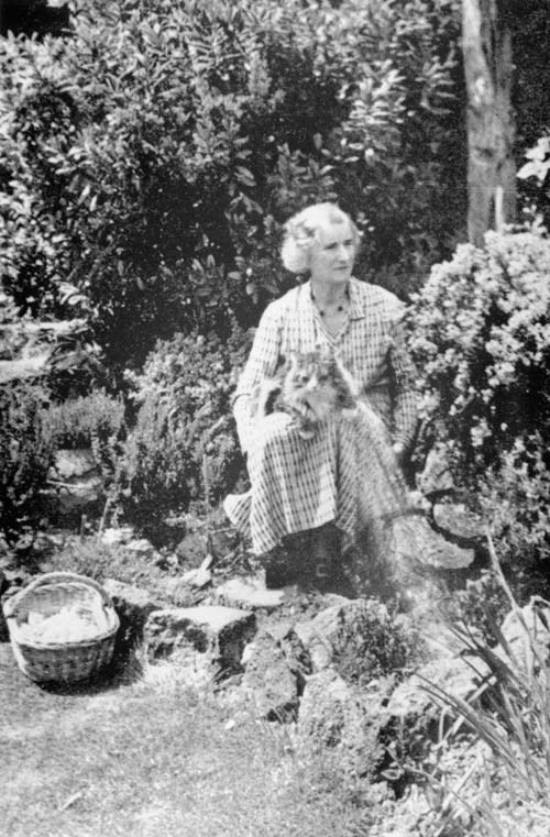 Ursula Bethell in her garden, about 1940