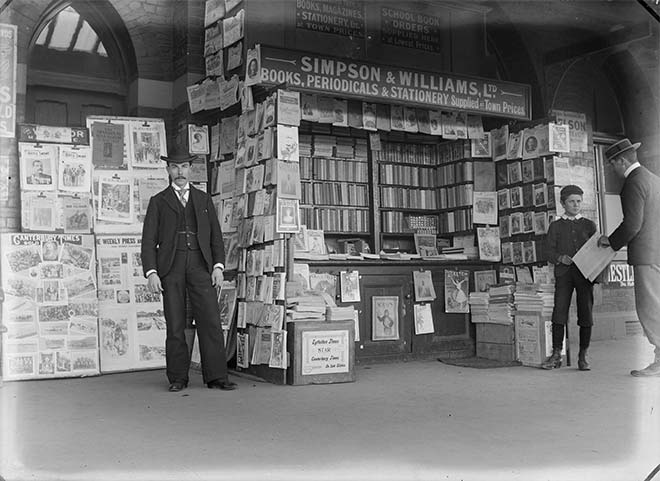 Newsagent and newsboy, Christchurch, early 20th century
