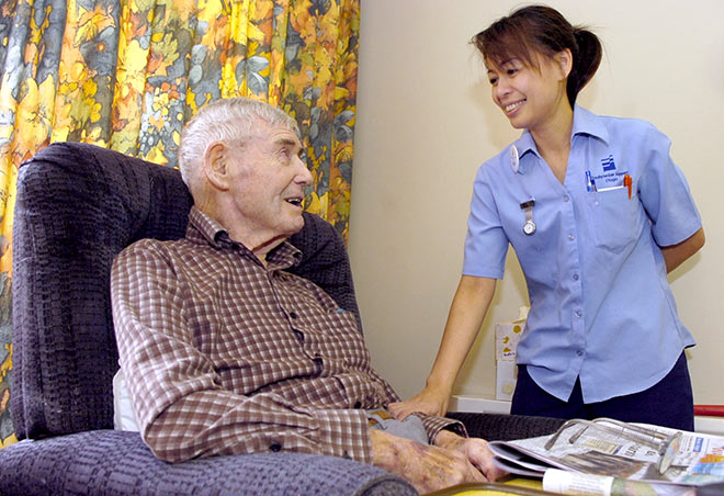 Filipino nurse with patient, 2009
