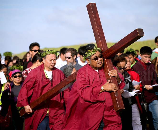 Religious observance: Carrying the cross