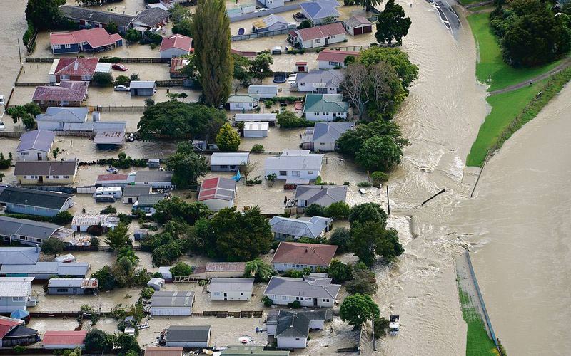 Around 50 flooded suburban houses and a broken stop bank.