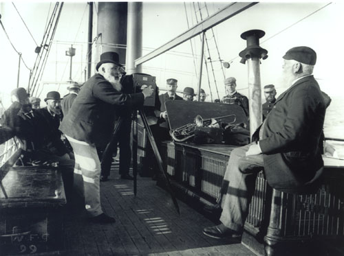 William Fitzgerald Crawford taking a photograph, 1897