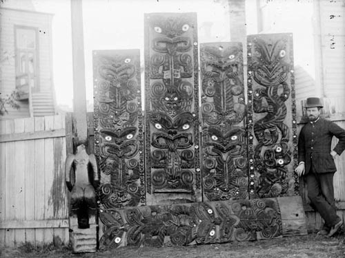 Augustus Hamilton with Maori carvings