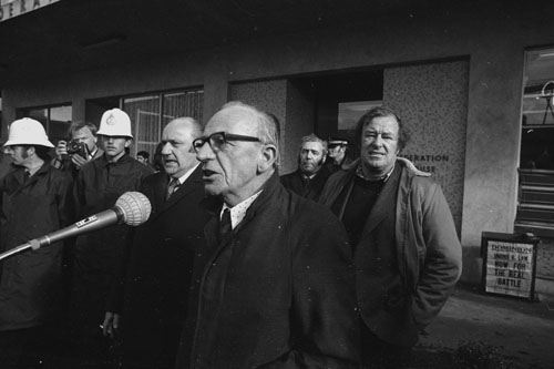 Toby Hill (speaking into the microphone), 1974
