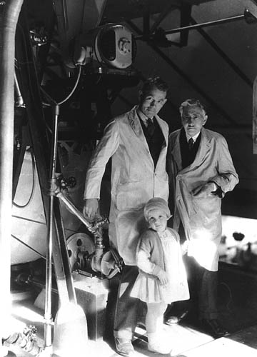 Frederic Truby King (right) with the manager of Karitāne Products Society Ltd, and Adeline, a Plunket-raised child