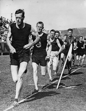 Randolph Rose leading the field in a track race, 1930s