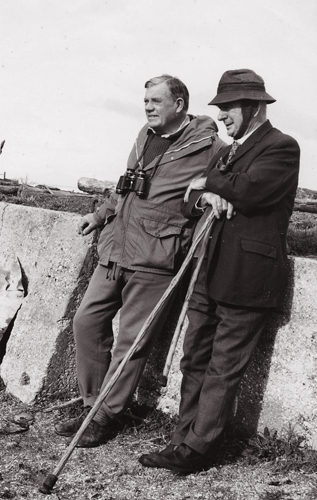 Dick Sibson (left) and his friend Ross McKenzie birdwatching at the limeworks at Miranda in the Firth of Thames, 1960s