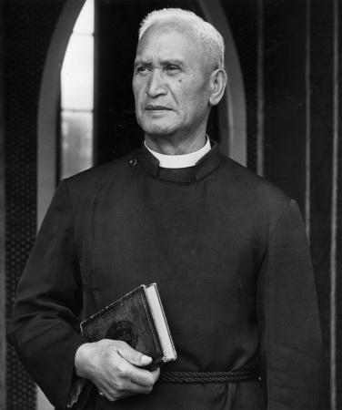 Pāora Temuera photographed in the doorway of Rangiātea Church, Ōtaki, in 1950