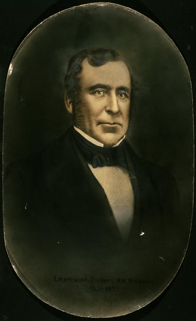 Portrait of man in suit and bow tie
