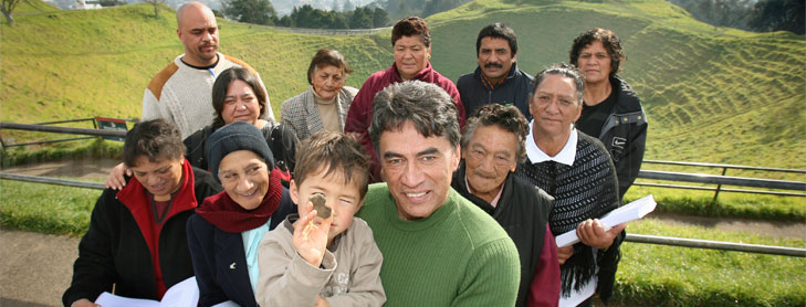 Family group in front of paddocks