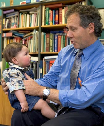 General practitioner William Ferguson with baby