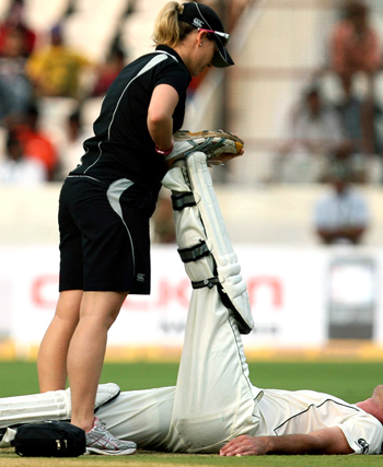 Physio on the cricket field