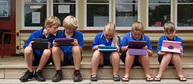 Students at Leamington Primary School in Cambridge using iPads in 2014