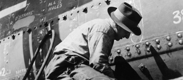 Riveting a steel minesweeping trawler