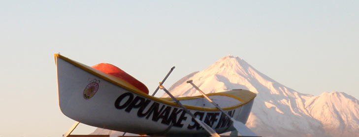 Opunake surf boat with Mt Taranaki in background