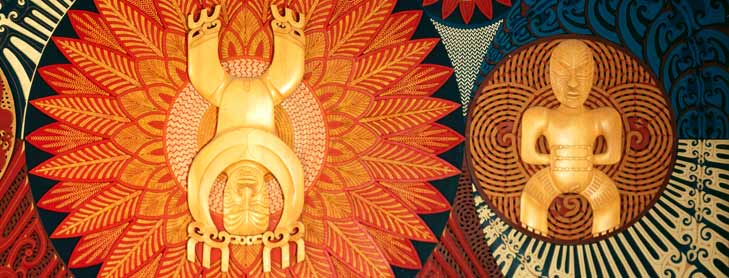 Artwork depicting two large Māori figures, one up-side-down