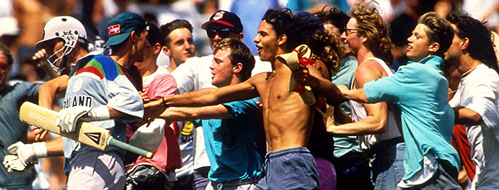 Excited cricket fans at match