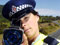 A police officer using a laser speed camera, 2009
