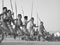 The Māori Battalion performs a haka for the King of Greece in Egypt, 1941