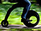 Greg Ryan riding his invention, the YikeBike