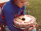 Philip Mayes celebrates his fourth birthday with a 'Hickory dickory dock' cake, 1981